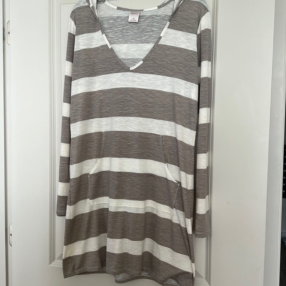 Women’s swimsuit, cover-up, has hood, Pockets, soft material, size medium.